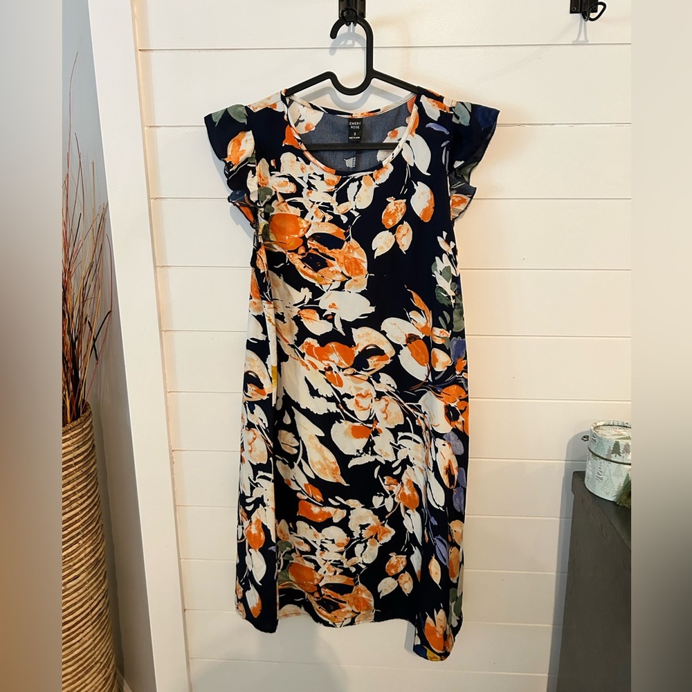 Floral patterned mid length dress.